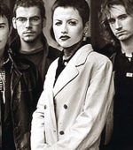 Dolores pictured with The Cranberries around the time of Zombie's original release in 1994