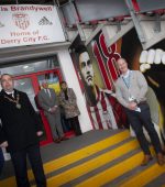 MARK FARREN MURAL. . . .The Mayor of Derry City and Strabane District Council, Brian Tierney pictured with the late Mark Farren’s parents Michael and Kathleen at the launch of the their’ son’s mural at the Ryan McBride Brandywell Stadium yesterday afternoon. Included on right is Steve Setterfield, Leisure and Sports Operations Manager, DCSDC. (Photos: Jim McCafferty Photography)