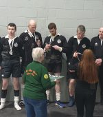Clonmany B are presented with their silver medals