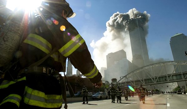 394263 12: (PUERTO RICO OUT) Firefighters walk towards one of the tower at the World Trade Center before it collapsed after a plane hit the building September 11, 2001 in New York City. (Photo by Jose Jimenez/Primera Hora/Getty Images)