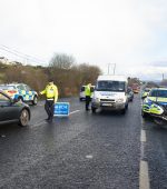 Garda performing a roadside check at the launch of the Christmas Road Safety Campaign in Donegal on Thursday last.  Photo Clive Wasson
  Photo Clive Wasson
