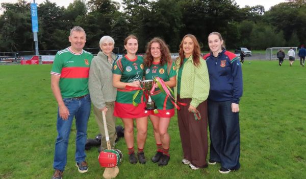 Clíona and Ciara Gibbons with family
