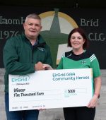 Conal McLoone, EirGrid presenting  Mary Cooke, Naomi Brid, GAA Laghey with a cheque for €5000 from EirGrid GAAA Community Heroes. Also included is Ava Cooke. Photo Clive Wasson