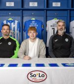 BALLYBOFEY, IRELAND - October 4 2024: Finn Harps Academy graduate, Darragh Coyle, signs a two-year deal with Finn Harps. Pictured left to right are Kevin McHugh (Finn Harps Coach), Darragh Coyle, Tommy Canning (Finn Harps Coach) at Finn Park in Ballybofey, Donegal. (Photo by Clare McCahill)