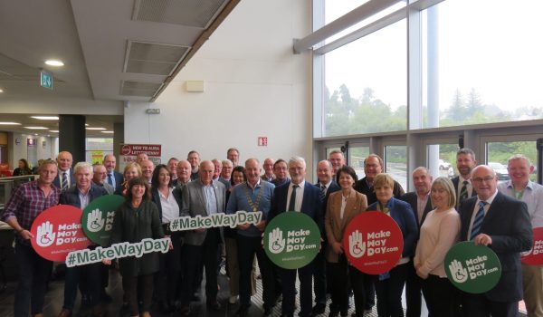 Cathaoirleach of Donegal County Council, Cllr Liam Blaney, and Chief Executive, John G. McLaughlin, stand together with Elected Members and staff in support of people with disabilities to raise awareness for ‘Make Way Day’