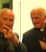 Harry Gregg with Fr Michael Sweeney in his visit to Ramelton a few years back.