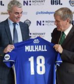 Jim McGuinness presenting Ambassador Mulhall with a Charlotte Independence team jersey.