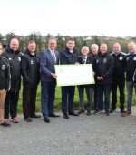 Minister pictured at Leckview with members from Letterkkeny Rovers FC