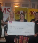 Neil three charity reps cheque