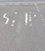 Faded stop markings