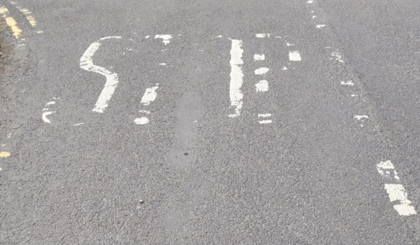 Faded stop markings