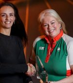 Mariana Mulhall, Signify, presenting the December award to Teresa McDaid, Senior Team Operations Manager Athletics Ireland