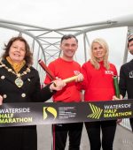 Mayor of Derry City and Strabane District Council, Councillor Patricia Logue, launching the 2024 Waterside Half Marathon on the Pennyburn Footbridge with last year’s Men’s Winner Kyle Doherty and Louise Wilkinson and Patrick McCarry from Star Running Club who will provide some of the pacers at the event.
