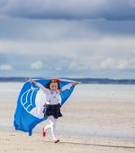 Embargoed until 12 noon Thursday 26th May 2016No repro Fee26-5-2016**Coastal Awards Recognise Ireland’s Best Beaches and Marinas**Picture shows Caoimhe Culhane (5) celebrating An Taisce’s Blue Flag Awards 2016 at Seapoint,Co Dublin.Pic:Naoise Culhane-no fee85 International Blue Flag and 56 National Green Coast Awards for IrelandToday, An Taisce announced the International Blue Flag Award and the National Green Coast Award recipients for the 2016 bathing season. A total of 141 awards were presented by the Minister for the Environment, Community and Local Government, Mr. Simon Coveney, T.D, at an awards ceremony held on the Velvet Strand, Portmarnock in Fingal at 12 noon today.Speaking at the awards Minister Coveney noted that “In Ireland, we are particularly fortunate to have a varied and beautiful coastline with many pristine beaches that are open to the public to enjoy. However, we cannot rest on our laurels and must continue to make strident efforts to protect and improve our waters. This will ensure that we, and future generations, can continue to enjoy this wonderful resource.”Mr. Ian Diamond, Coastal Awards Manager at An Taisce’s Environmental Education Unit speaking at the awards said:“I would like on behalf of An Taisce to pay tribute to the Local Authorities and marina operators here today for all their efforts in ensuring that the sites being awarded for the 2016 bathing season have achieved the excellent standards required by the Blue Flag and Green Coast Awards”. The 79 Irish beaches and 6 marinas are awarded the prestigious Blue Flag Award for the 2016 bathing Season.The Blue Flag is one of the world’s most recognised eco-labels. The programme aims to raise environmental awareness and promote sound environmental practices and behaviours among beach and marina users.  The 79 Irish beaches and 6 marinas that achieved this accolade met a specific set of criteria related to water quality, information provision, environmental education, safety and beach management. As a pre-requisite, the bathing water at Blue Flag beaches must meet the highest standards of bathing water quality. The overall Blue Flags in Ireland this year is down only one on 2015, whilst four of the beaches awarded in 2015 did not retain Blue Flag status, the Blue Flag will be raised for the first time at Ballymoney North Beach in Wexford and Brittas Bay North regains Blue Flag status lost last year. Fenit Marina in Kerry has also been awarded a Blue Flag this year whilst all of the marinas awarded last year have retained Blue Flag status for the coming season.An Taisce – The National Trust for Ireland is responsible for the operation of the Blue Flag programme in Ireland on behalf of the Foundation of Environmental Education. Blue Flag Applications were not received for the following beaches that had been in receipt of the award in 2015: Redbarn (Cork), Garretstown (Cork), and Portrane (Fingal). These beaches did not meet the excellent water quality standard required for Blue Flag status. Ross Strand in Mayo was not awarded the Blue Flag due to there being less lifeguard cover than advised during in-season control visits. 56 Beaches receive the Green Coast Award for the 2016 Bathing SeasonThe Green Coast Awards were presented back in 2003 to four beaches in County Wexford.  Since then, the award has gone from strength to strength recognising beaches for their clean environment, excellent water quality and natural beauty. An important aspect of the Green Coast Awards is the involvement of Clean Coasts groups of which there are now 499 comprised of thousands of volunteers throughout the island. These volunteers participate in community clean-ups and coastal enhancement projects at their local beaches throughout the year.56 beaches in Ireland were awarded the Green Coast Award representing a decrease in 3 awards since 2015. Boatstrand in Waterford is being awarded for the Green Coast Award for the first time since 2010, whilst Red Strand in Cork has regained the award due in part to improved water quality. Having not met the excellent water quality standard required, Rocky Bay in Cork, Portrane in Fingal, Mayo’s White Strand and Cross in Louisburgh did not retain the award for the 2016 bathing season.Media contact: Ian DiamondTel: 01 4002229 / 085 7480874Pic:Naoise Culhane-no fee