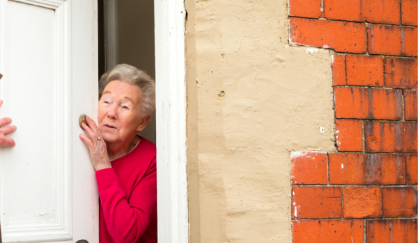 bogus caller scam door elderly