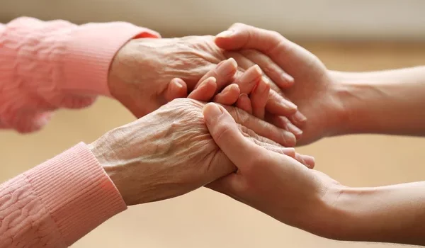 depositphotos_63463595-stock-photo-old-and-young-holding-hands