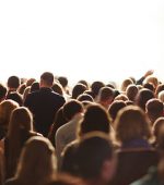 Heads of crowd of fans during concert of popular singer